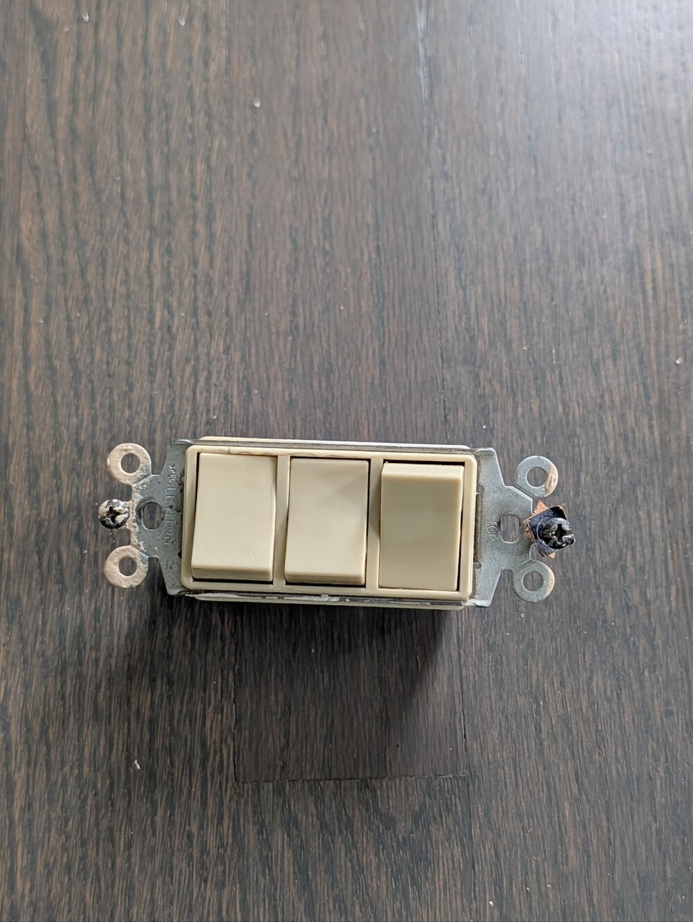 Broan Model 66V Triple Rocker Wall Switch (Ivory)